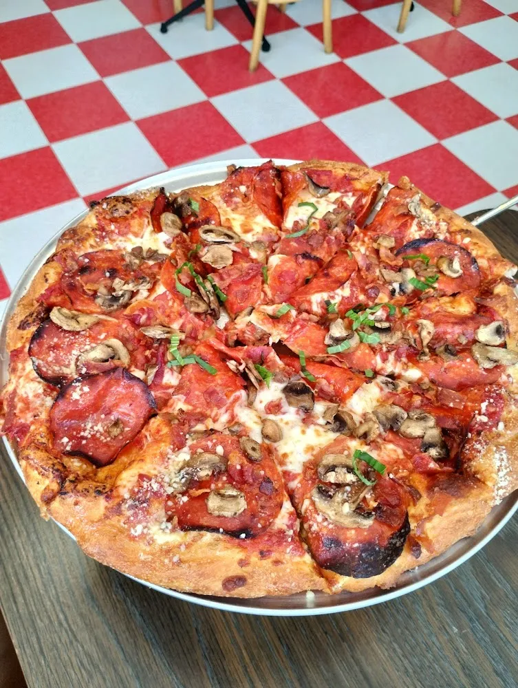 Pepperoni Onion and Mushroom Pizza